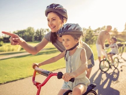 Families in Berlin - Mother and daughter on bike